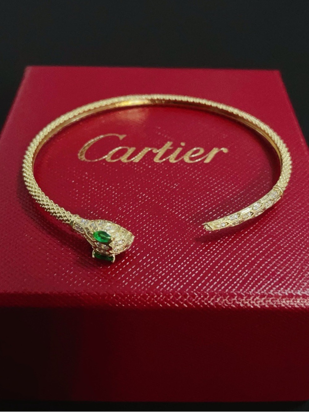 Cartier Gold Snake Head Cuff with Green and Clear Stones